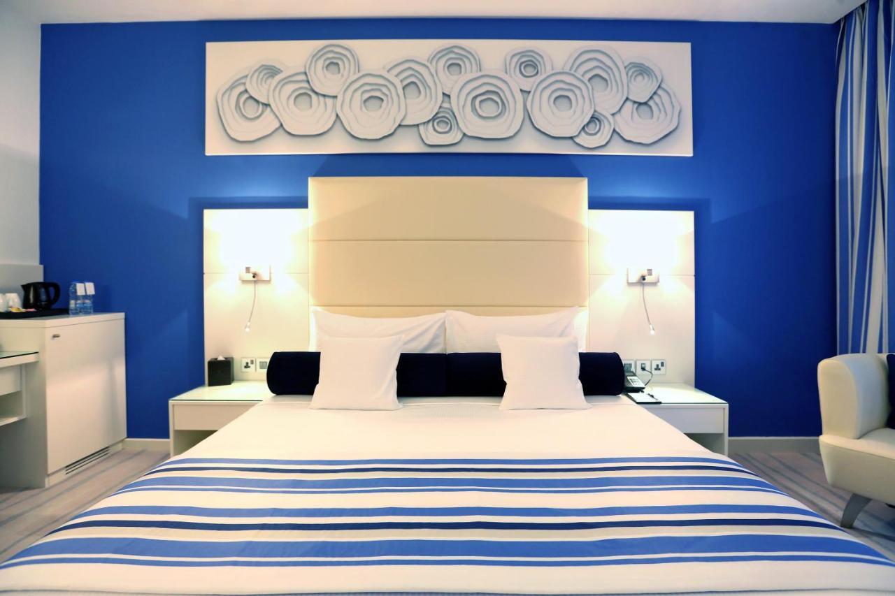 Готель Golden Tulip Downtown